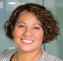 Claire Ashford, compliance head at a financial regulation firm, portrait.